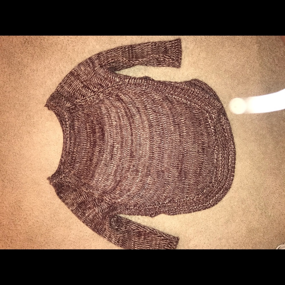 Sweater with slits on the side.